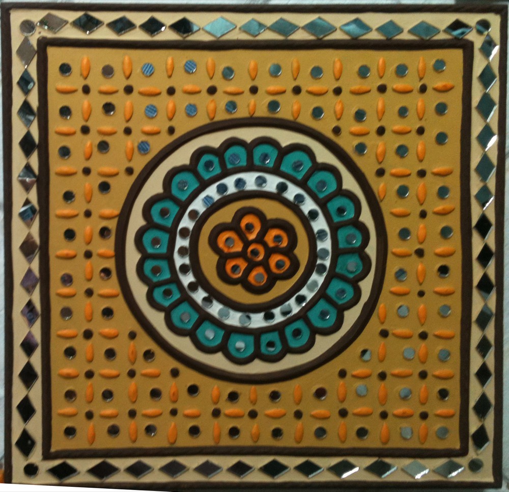 Yellow mud art with blue design